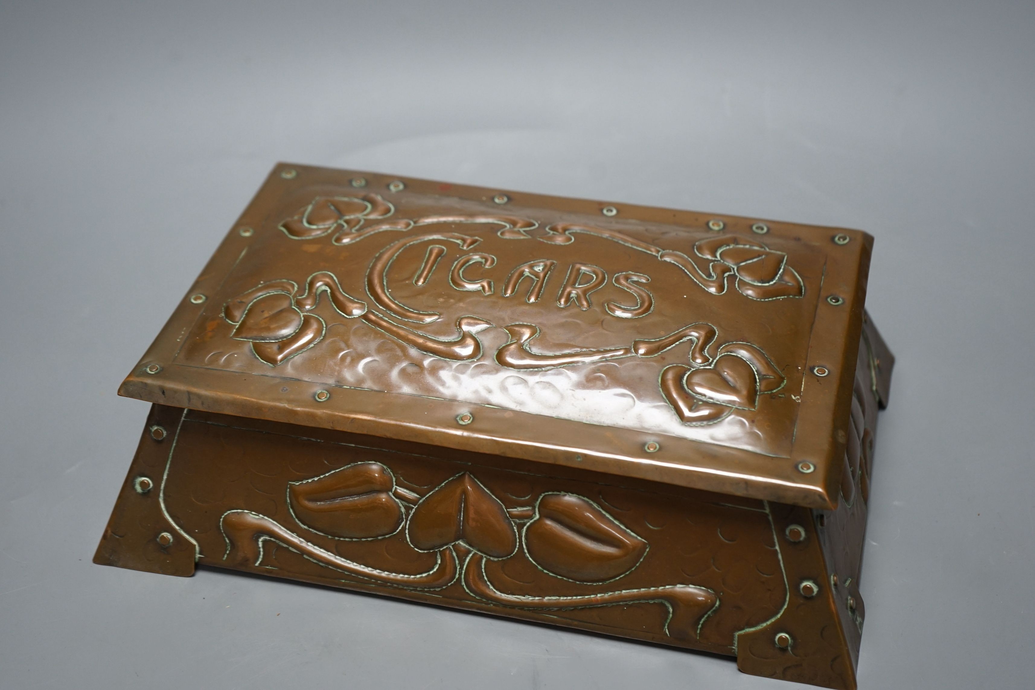 An Art Nouveau copper Cigars box. J.F. Pool of Hayle, 29cms wide x 19cms deep